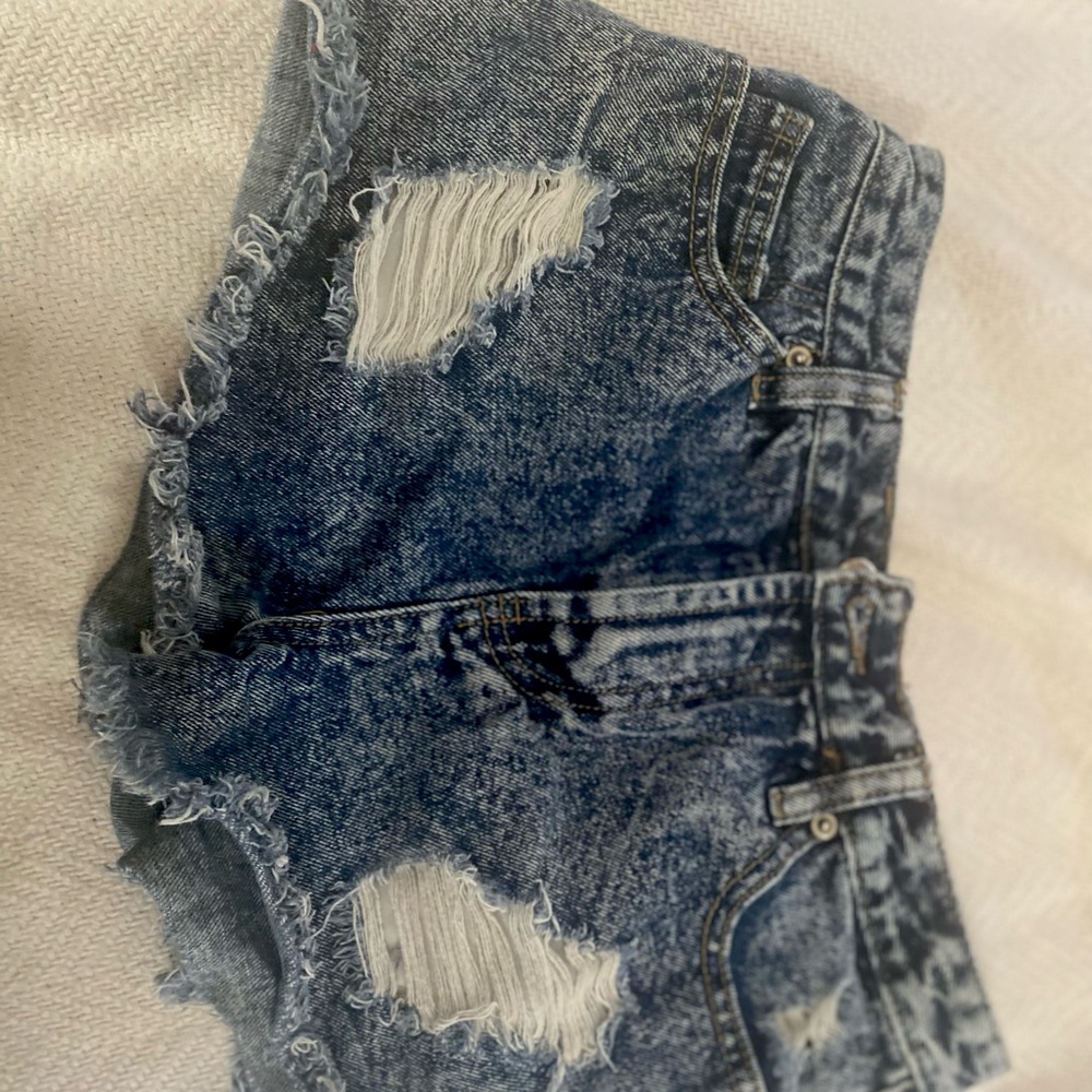 High waisted Acid washed blue Jean shorts with rips